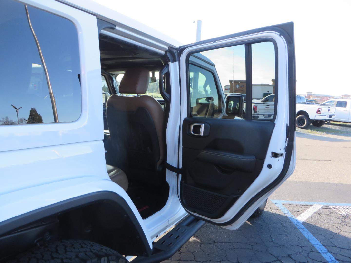 2020 White /TAN Jeep Wrangler Unlimited Rubicon (1C4HJXFG8LW) with an 3.6L V6 DOHC 24V FFV engine, 6A transmission, located at 2630 Grass Valley Highway, Auburn, CA, 95603, (530) 508-5100, 38.937893, -121.095482 - 3" Zone offroad suspension system, Fox adventure series shocks, rocksliders, Teraflex HD tire relocation, Mopar HD tailgate hinge, 17" KMC wheels, and 37" BFG KO2 tires. - Photo#52